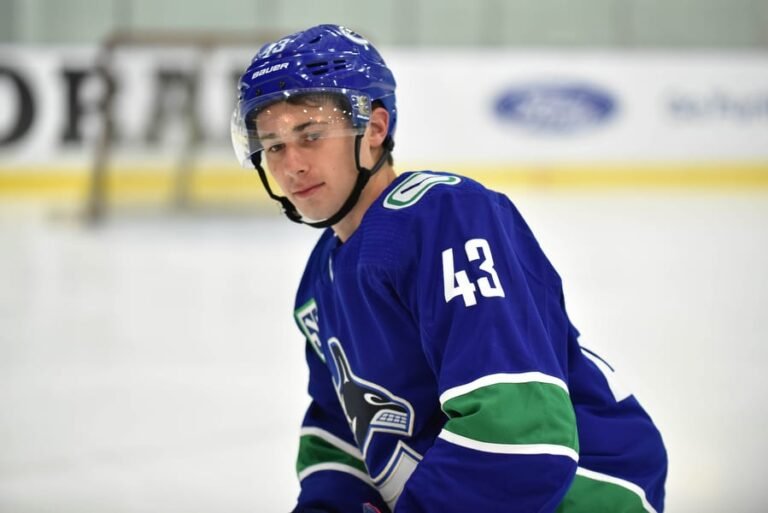 quinn-hughes-steven-ellisthe-hockey-news
