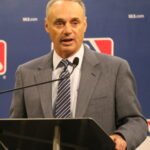 MLB COO Rob Manfred speaks during a press conference at FanFest.