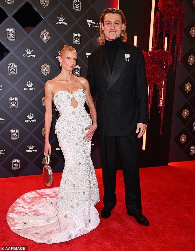 102369269-15124899-The_Collingwood_key_defender_attended_the_AFL_s_night_of_nights_-m-3_1758622129564